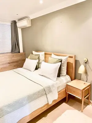 Un ou plusieurs lits dans un hébergement de l'établissement Etage privé vue sur la seine
