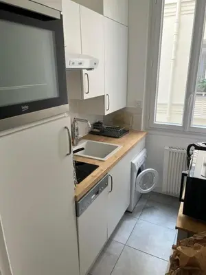Cuisine ou kitchenette dans l'établissement Appartement Ternes - Arc de Triomphe