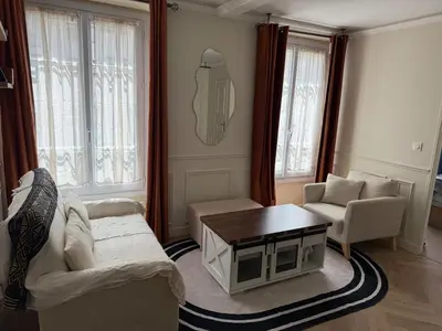 Coin salon dans l'établissement 2 bedrooms Cozy & stylish, 15min walk from Eiffel Tower garden