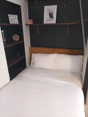 Un ou plusieurs lits dans un hébergement de l'établissement 2 bedrooms Cozy & stylish, 15min walk from Eiffel Tower garden