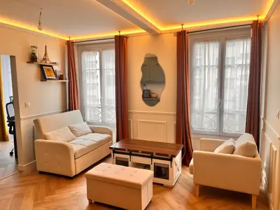 Coin salon dans l'établissement 2 bedrooms Cozy & stylish, 15min walk from Eiffel Tower garden