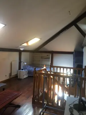 Un ou plusieurs lits dans un hébergement de l'établissement Studio lumineux à deux pas des Puces de St Ouen