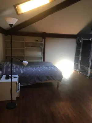Un ou plusieurs lits dans un hébergement de l'établissement Studio lumineux à deux pas des Puces de St Ouen