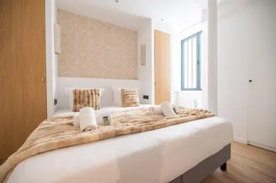 Un ou plusieurs lits dans un hébergement de l'établissement Stylish Studio in East Paris