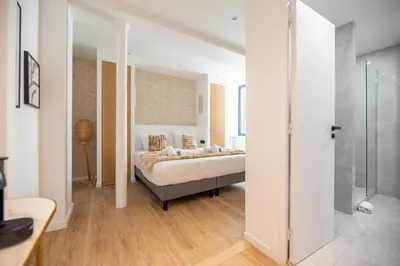 Un ou plusieurs lits dans un hébergement de l'établissement Stylish Studio in East Paris