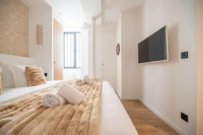 Un ou plusieurs lits dans un hébergement de l'établissement Stylish Studio in East Paris