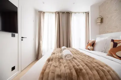 Un ou plusieurs lits dans un hébergement de l'établissement Brand New Flat in Paris XI