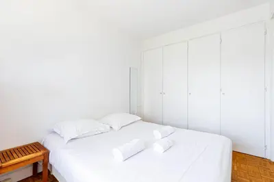 Un ou plusieurs lits dans un hébergement de l'établissement GuestReady - Tranquil city stay near Montparnasse