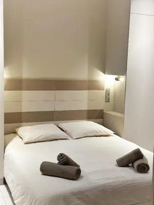 Un ou plusieurs lits dans un hébergement de l'établissement Celine 24 Le Flandrin Haussmann, Appart spacieux dans le 16e