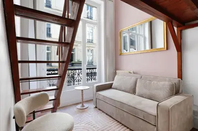 Coin salon dans l'établissement BM-Appartement Design en Duplex Champs-Elysees