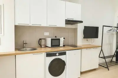 Cuisine ou kitchenette dans l'établissement Appartement atypique avec Mezzanine - Paris 9 - 6P