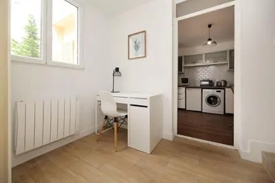 Cuisine ou kitchenette dans l'établissement Appartement avec bureau proche Montmartre - P2