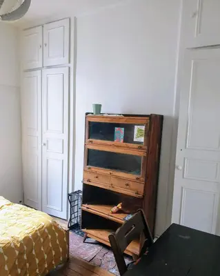 Un ou plusieurs lits dans un hébergement de l'établissement Classic Parisian 2 BR flat in Paris 10