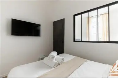 Un ou plusieurs lits dans un hébergement de l'établissement Charming 1BR apartment near Gare de Lyon