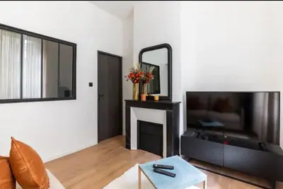 Coin salon dans l'établissement Charming 1BR apartment near Gare de Lyon
