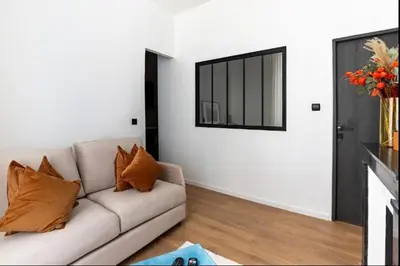 Coin salon dans l'établissement Charming 1BR apartment near Gare de Lyon