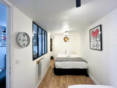 Un ou plusieurs lits dans un hébergement de l'établissement Appartement 10 - Paris Faubourg Bail Mobilité