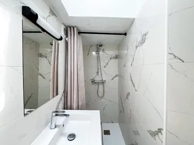 Salle de bains dans l'établissement Appartement 10 - Paris Faubourg Bail Mobilité