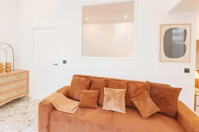 Coin salon dans l'établissement Appartement Bonne nouvelle - REX - Paris 10 - 6P