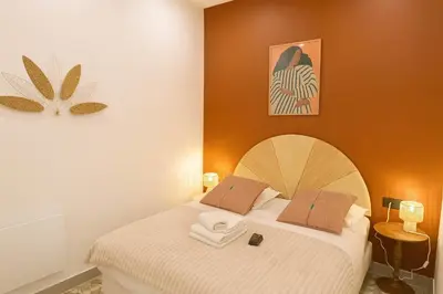 Un ou plusieurs lits dans un hébergement de l'établissement Appartement Bonne nouvelle - REX - Paris 10 - 6P