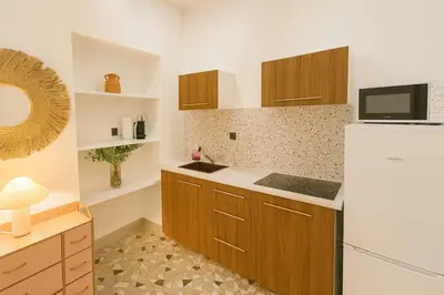 Cuisine ou kitchenette dans l'établissement Appartement Bonne nouvelle - REX - Paris 10 - 6P