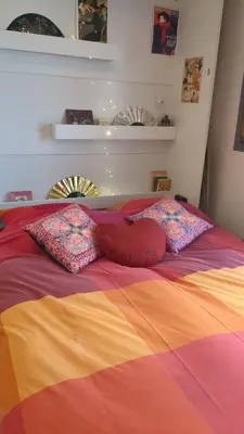 Un ou plusieurs lits dans un hébergement de l'établissement Cosy renovated little nest in historic MONTMARTRE