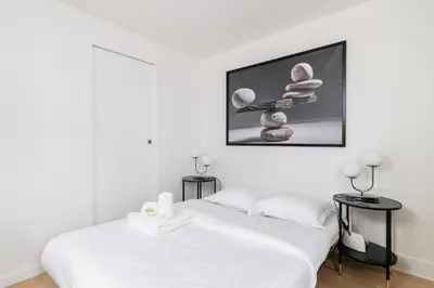 Un ou plusieurs lits dans un hébergement de l'établissement Studio cosy refait a neuf Maris paris 3 - 2P
