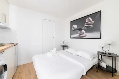 Un ou plusieurs lits dans un hébergement de l'établissement Studio cosy refait a neuf Maris paris 3 - 2P