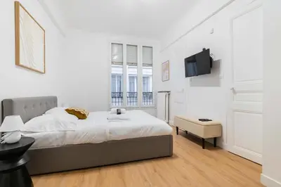Un ou plusieurs lits dans un hébergement de l'établissement Studio elegant sacre coeur metro anvers - Paris 18 -2P