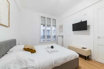 Un ou plusieurs lits dans un hébergement de l'établissement Studio elegant sacre coeur metro anvers - Paris 18 -2P