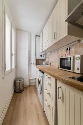 Cuisine ou kitchenette dans l'établissement 2 pieces confortable metro duroc - Paris 6 -4p