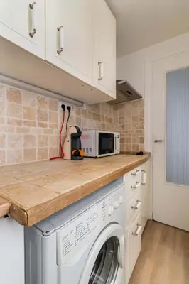 Cuisine ou kitchenette dans l'établissement 2 pieces confortable metro duroc - Paris 6 -4p