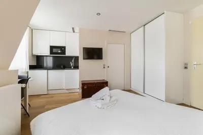 Un ou plusieurs lits dans un hébergement de l'établissement Studio refait a neuf metro pereire paris 17 - 2P
