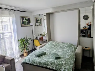 Un ou plusieurs lits dans un hébergement de l'établissement Cozy Studio Paris Porte de Versailles