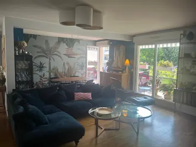 Coin salon dans l'établissement Chez l habitant chambre et salle de bains autonomes