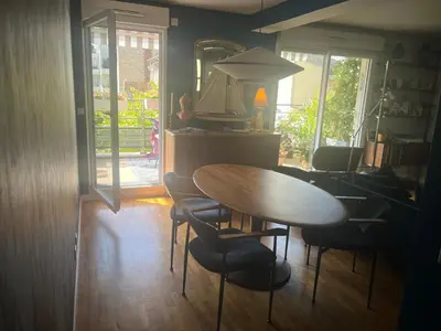 Coin salon dans l'établissement Chez l habitant chambre et salle de bains autonomes