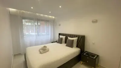 Un ou plusieurs lits dans un hébergement de l'établissement Appartement La Défense 10P