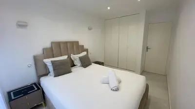 Un ou plusieurs lits dans un hébergement de l'établissement Appartement La Défense 10P