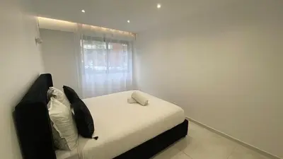 Un ou plusieurs lits dans un hébergement de l'établissement Appartement La Défense 10P