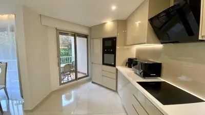 Cuisine ou kitchenette dans l'établissement Appartement La Défense 10P