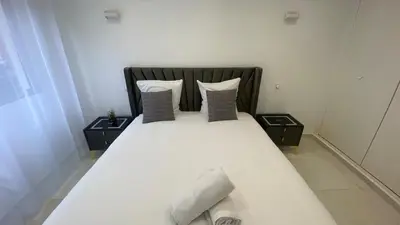 Un ou plusieurs lits dans un hébergement de l'établissement Appartement La Défense 10P