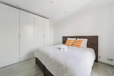 Un ou plusieurs lits dans un hébergement de l'établissement Charmant appt 1BR 2P Neuilly-sur-Seine