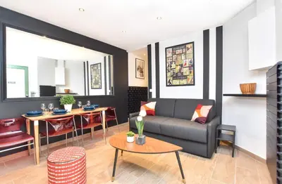 Coin salon dans l'établissement Cosy appartment 1BR 4P Place des Vosges