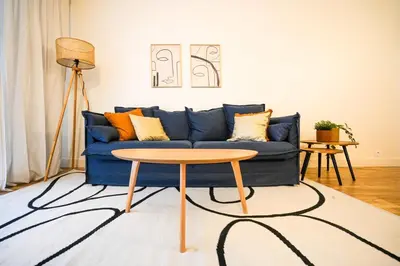 Coin salon dans l'établissement Cozy apartment in Paris 15 & Eiffel Tower