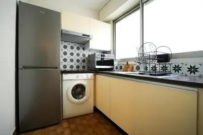 Cuisine ou kitchenette dans l'établissement Cozy apartment in Paris 15 & Eiffel Tower