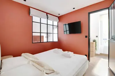 Un ou plusieurs lits dans un hébergement de l'établissement Luxury Appartement 6p L001