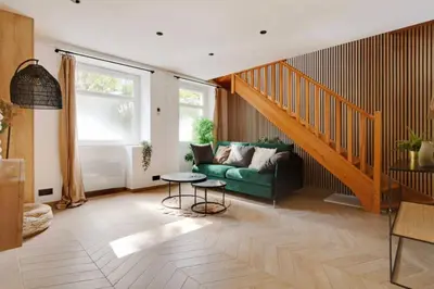 Coin salon dans l'établissement Luxury Appartement 6p L001