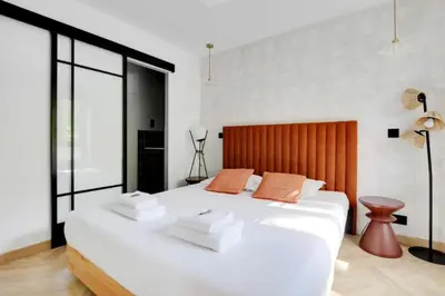 Un ou plusieurs lits dans un hébergement de l'établissement Luxury Appartement 6p L001