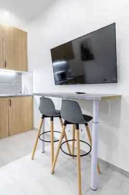 Télévision ou salle de divertissement dans l'établissement Studio de charme au coeur des Batignolles