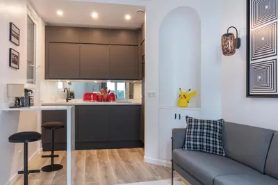 Cuisine ou kitchenette dans l'établissement Superbe appartement cosy et design Paris 17